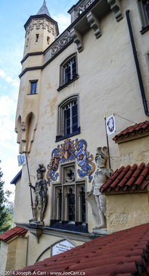 Crest and statutory decorating the outside of Hohenschwangau Castle
