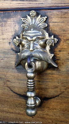 Ornamental brass door knocker