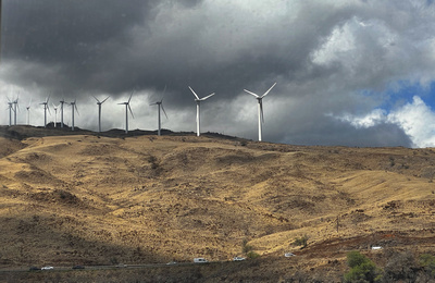 Wind turbines on the ridgeline of the West Maui mountains