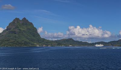 Vaitapu harbour, cruise ship and Mt. Otemanu