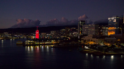 Aloha Tower on the harbour after sunset