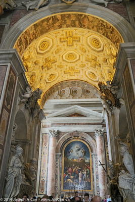 Huge painting and alter with gold ceiling and statues