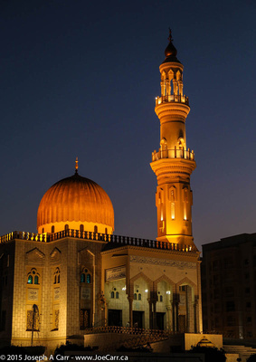 Al-Zawawi Mosque lit at night