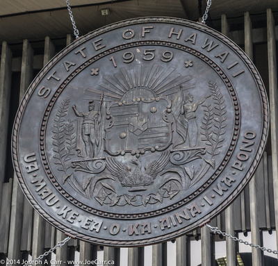State of Hawaii bronze crest in front of the State Capitol Building
