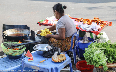 Street vendor frying food