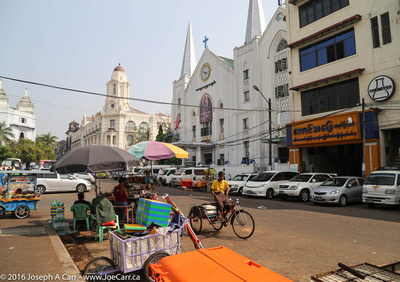 Street vendors and a Immanuel Baptist Church behind