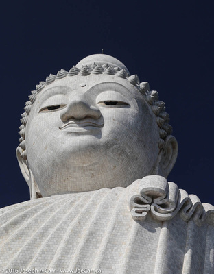 Big Buddha against a blue sky