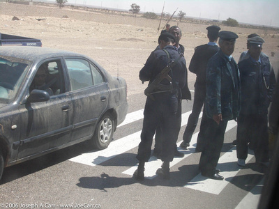 Officers at a security checkpoint
