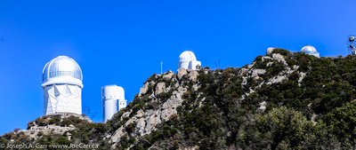 The Mayall, Stewart, UofA Spacewatch and Warner & Swasey observatories on the north ridgeline