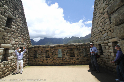 Grimaldo explaining to John & Wendy McDonald how Incan houses were constructed