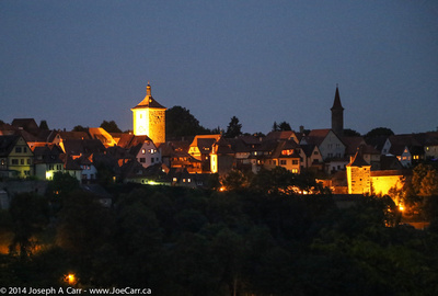 Looking back at night over the Tauber valley at the city from Castle Park