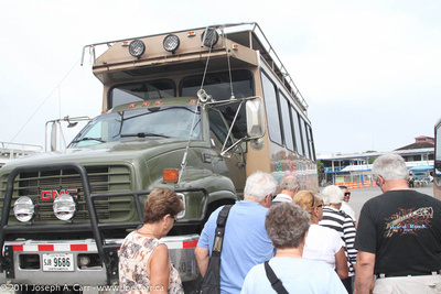 Tour group boarding the Off Road Adventure Bus
