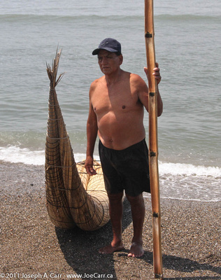 Fisherman and reed boat