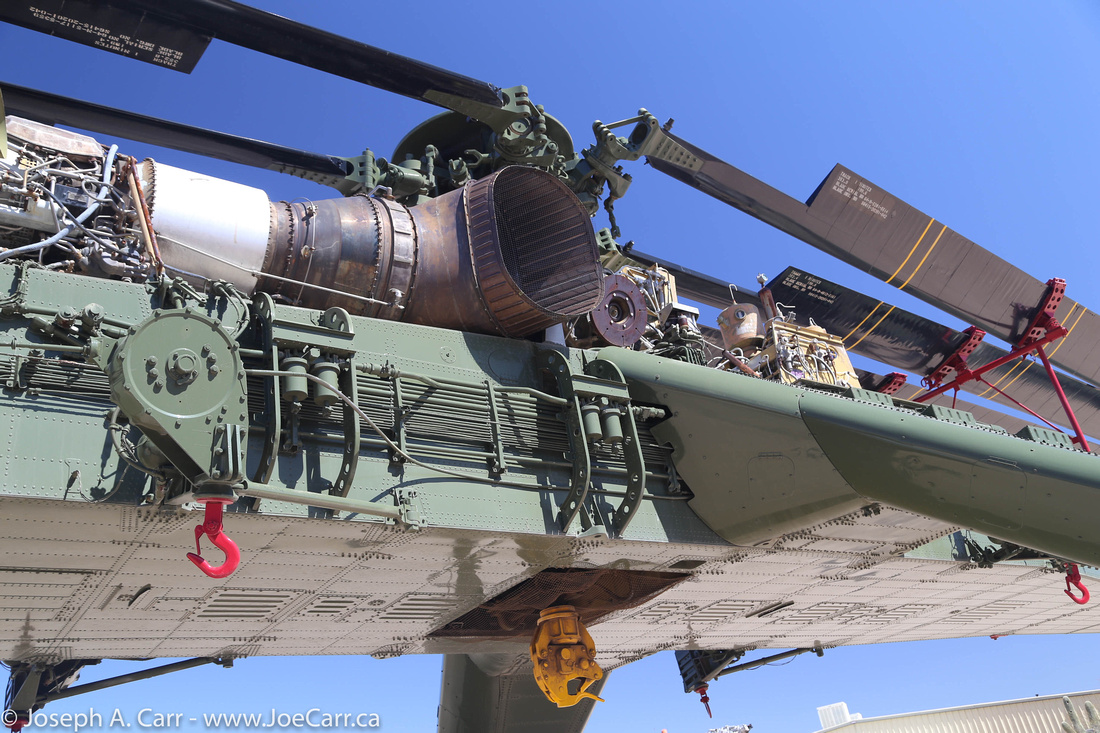 Engine, blades and winches of a Sikorsky CH-54A heavy lift transport helicopter