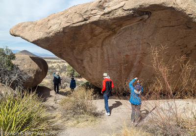 Garry, Lauri, Diane and John walking through a boulder formation