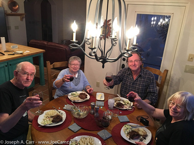 John, Lauri, Garry and Diane toasting our steak dinner