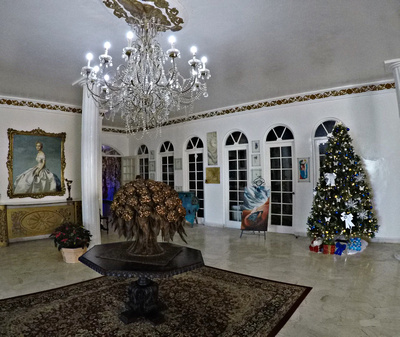 Hotel lobby, art and Christmas tree