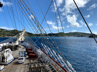 The foredeck of the Royal Clipper and Gustavia harbour