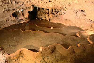 Stepped pools in a stream in the cave gallery