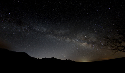 Pre-dawn Sagittarius area of the Milky Way with Venus, Saturn and Jupiter over the Dragoon Mountains