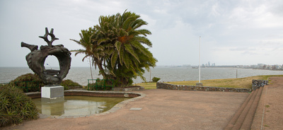 Bronze monument dedicated to the fallen heroes of the Navy with Montevideo behind