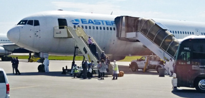 Boarding passengers Eastern Boeing 767-300 charter aircraft