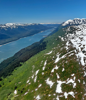 Flying over the last mountain ridge before returning to Juneau, flying north along Gastineau Channel