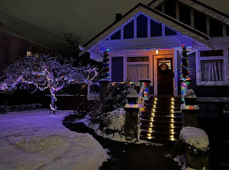 Neighborhood Christmas decorations at night