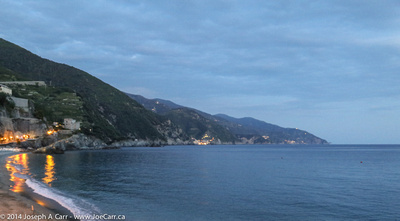 Looking south to Vernazza and Corniglia after dark with Monterosso beach