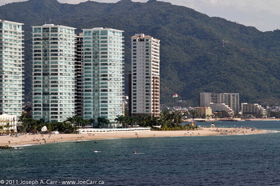 Ocean beach, pool and condominiums