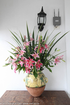 Flower arrangement at top of stairs