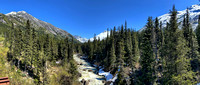 Our train waits on a bridge over a moutain stream for hikers to board
