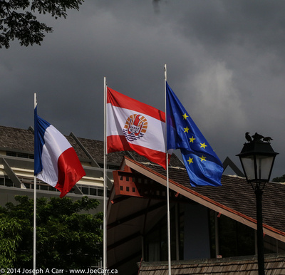 Three flags: France, French Polynesia, EU
