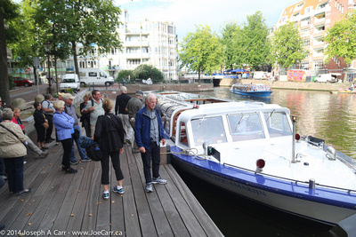 Our group waits to regroup after the canal tour boat