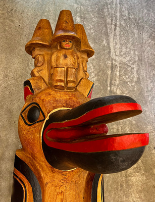 Top two figures on a totem being completed
