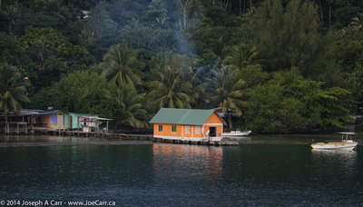 Bright orange boathouse and fishing shack