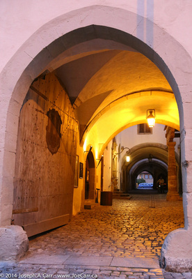 Lit passageway behind City Hall