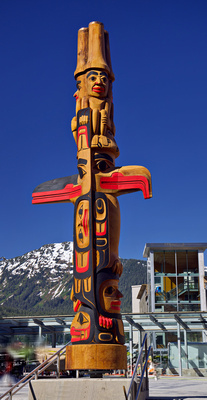 A beautiful totem pole in the public square