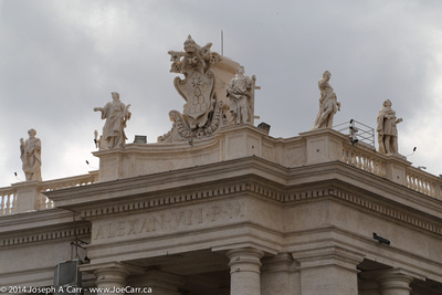 Roof line statues on top of the collonade around St. Peter's Square